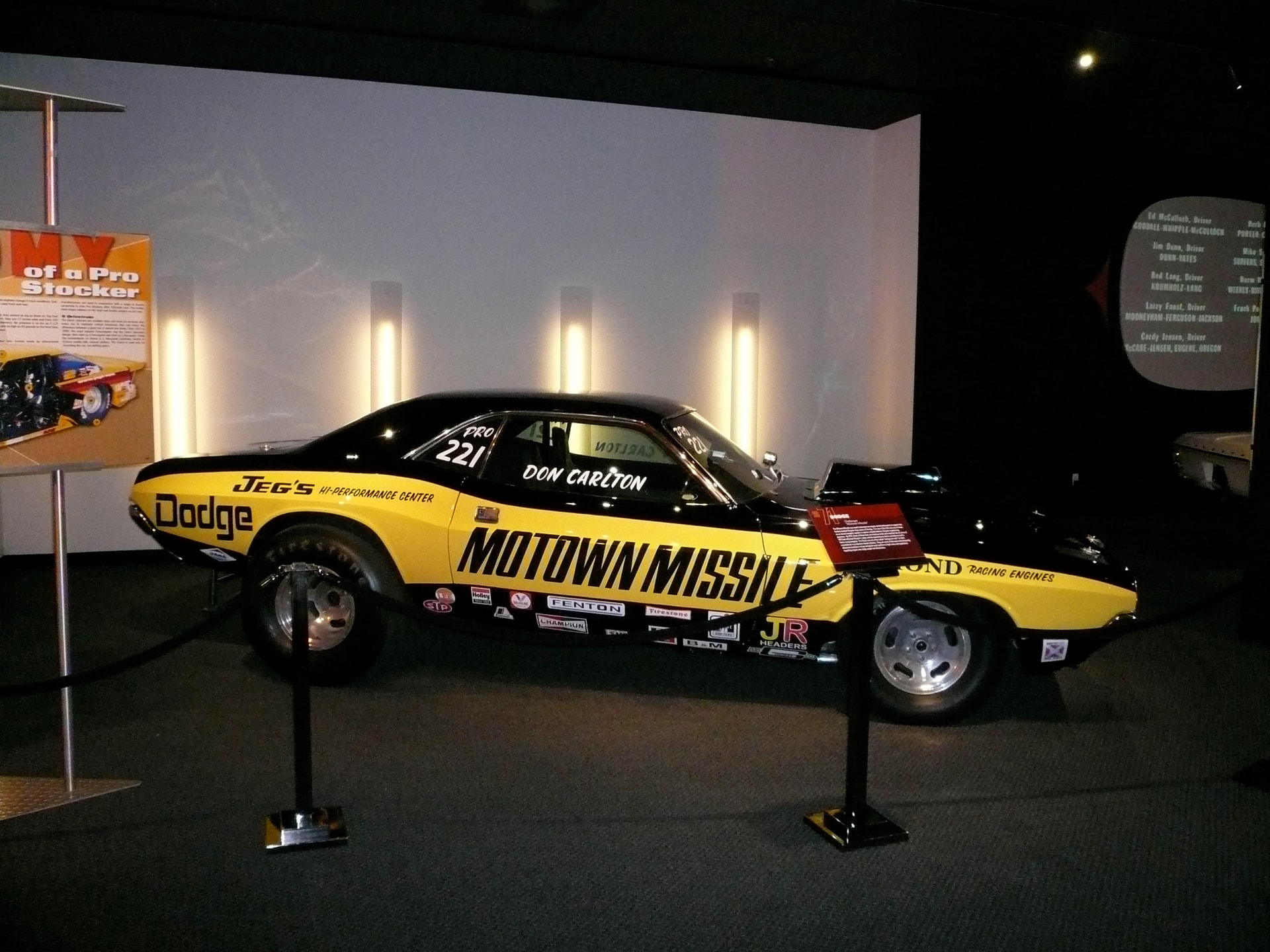 Motown Missile Challenger on museum display, black-and-yellow livery with Don Carlton lettering